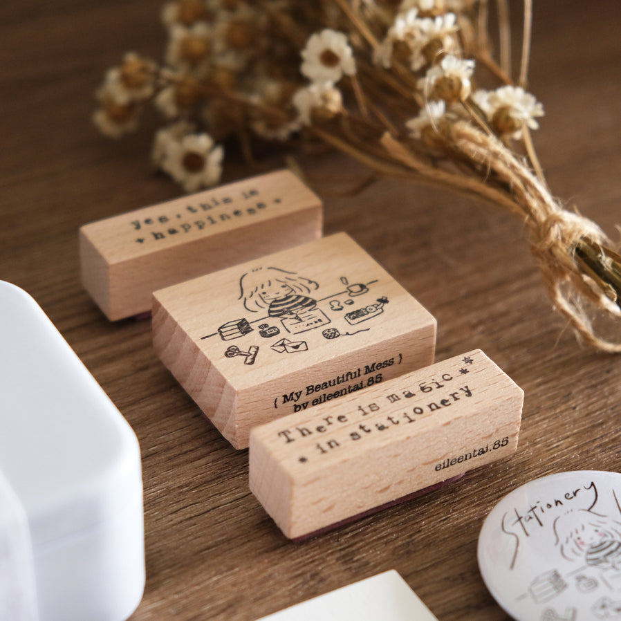 Wooden rubber stamps reading stationery affirmations, designed by Eileen Tai