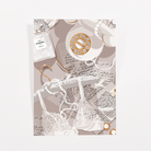 Taupe journaling card with a gold rotary telephone, pearl strands, lace, a gold hanger, and handwritten love letters
