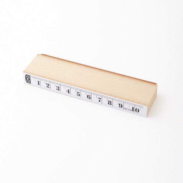 Nombre ruler clear stamp by mizushima, transparent acrylic with ruler markings.